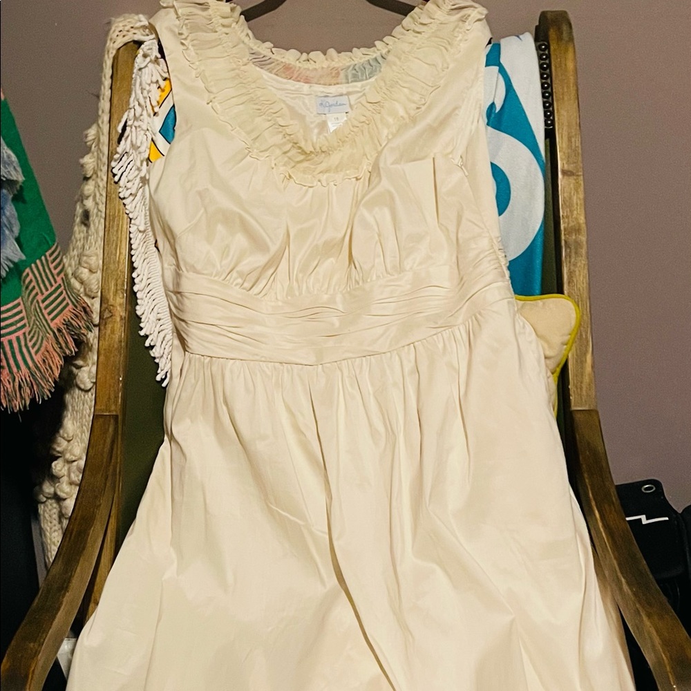Beautiful ivory mid-length sleeveless dress